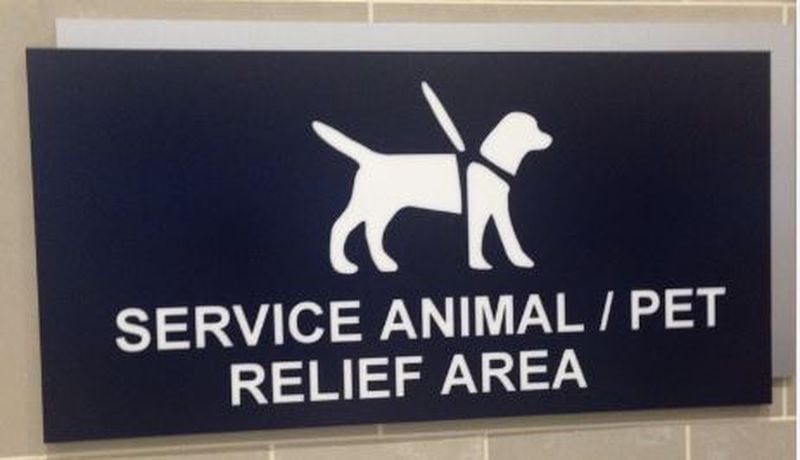 A pet relief area sign in an airport (Credit: Twitter)