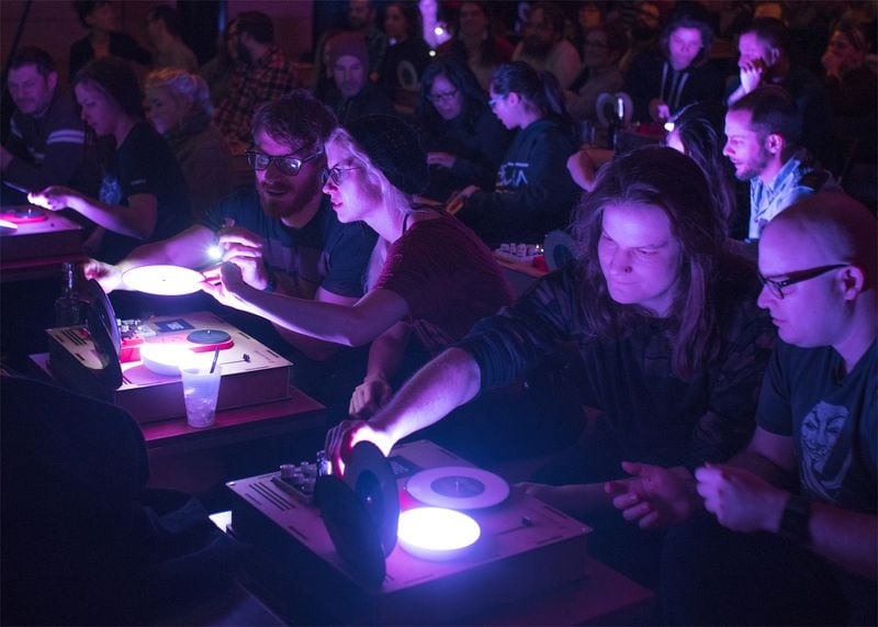 Kid Koala invites every audience member to play along while seated at mini turntable stations equipped with color-coded custom vinyl and effects processors. CONTRIBUTED: A.J. KORKIDAKIS