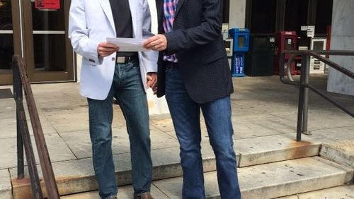 Decatur residents Drew Marlar, left, and Bryan Neumeier were married Saturday in DeKalb County despite already being legally married in New York. DANNY ROBBINS / DANNY.ROBBINS@COXINC.COM
