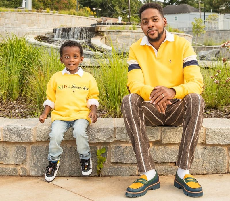 Designer Quintin Crumpler poses with his son in clothes from his line, Goat by James King. Crumpler says that like OutKast in its early years, Atlanta designers aren't understood outside their community. (Courtesy of Goat by James King)