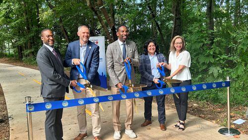 Mayor Andre Dickens, city officials, and PATH Foundation officials cut the ribbon on the Eastside Trolley Trail. (Courtesy of PATH Foundation)