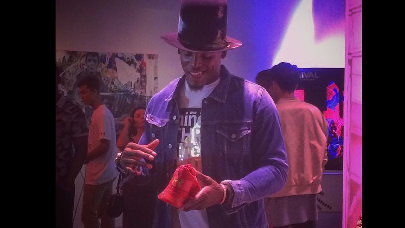 Cam Newton unveiled his new Under Armour shoes in Atlanta on Thursday, July 13.