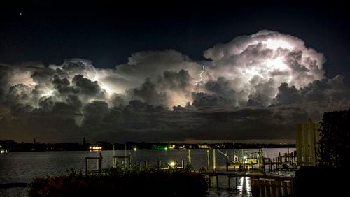 View of an approaching storm Sunday night as photographed looking west over the Loxahatchee River in Tequesta. (Melanie Bell / The Palm Beach Post)