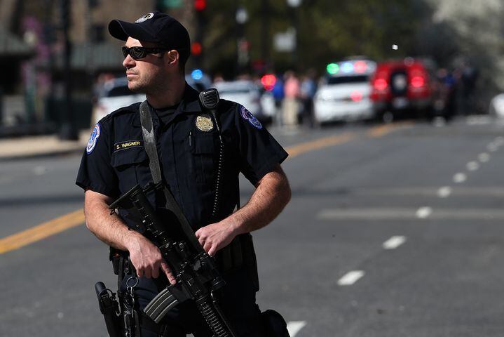 Photos: Man with gun shot at U.S. Capitol