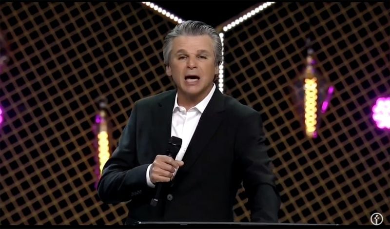 Pastor Jentezen Franklin began the livestreamed service at Free Chapel in Gainesville by reading the National Day of Prayer proclamation from President Donald Trump.  The president watched the church service online Sunday, March 15, 2020. 