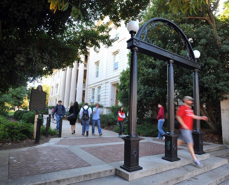 A student walks under the famed Arch on the University of Georgia campus.