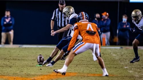 Georgia Tech kicker Jude Kelley kicks off against Virginia Oct. 23, 2021 at Scott Stadium in Charlottesville, Va. Kelley was named ACC specialist of the week for two successful onside kicks late in the game. (Georgia Tech Athletics/Keith Lucas)