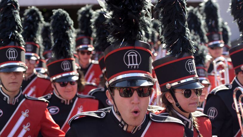 Members of the Georgia Redcoat Marching Band take to the field before the start of a Georgia game. (DAVID BARNES / DAVID.BARNES@AJC.COM)