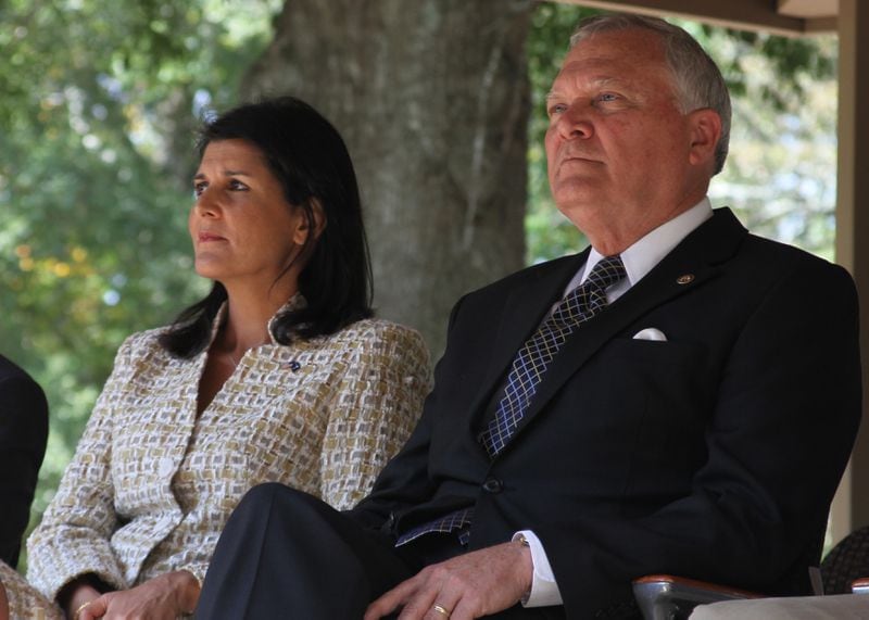 Nikki Haley, then the governor of South Carolina, sits with her then counterpart in Georgia, Nathan Deal, in September 2013. Haley began forging her connections to Georgia politicians during her two terms in the governor's office, even as South Carolina competed with its neighbor for economic development deals and port investment.