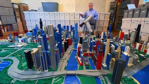 Kirk Ticknor, 61, the director of public works at Fort Moore, has built a 13-by-10-foot scale model of downtown Chicago — comprising approximately 500,000 Lego bricks. It will make its public debut this weekend at the inaugural LEGO Brick Convention in the Columbus Convention & Trade Center. (Photo Courtesy of Mike Haskey)