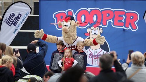 Atlanta Braves mascot Blooper takes photographs with fans during the Atlanta Braves Chop Fest at the Plaza at SunTrust Park Saturday, January 27, 2018, in Atlanta. 2018 Chop Fest is a fan interactive event allowing fans to interact with players, coaches, and participate in baseball clinics. PHOTO / JASON GETZ