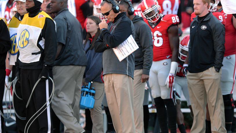 November 29, 2014 Athens - Georgia Bulldogs head coach Mark Richt reacts in the second half against the Georgia Tech Yellow Jackets at Sanford Stadium in Athens on Saturday, November 29, 2014. In the 109th playing of the Tech-Georgia game, the No. 16 Yellow Jackets ended the No. 9 Bulldogs�five-game winning streak in the series with a 30-24 overtime win at Sanford Stadium Saturday afternoon. HYOSUB SHIN / HSHIN@AJC.COM