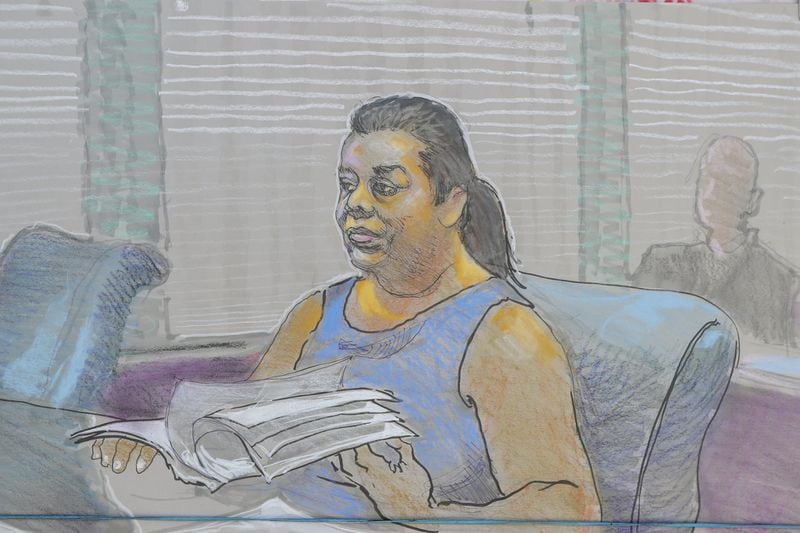 Artist’s rendering shows Sharon Barnes Sutton, the former DeKalb County commissioner, in federal court on Tuesday, May 21, 2019. Barnes Sutton pleaded not guilty to two counts of extortion and federal charges that she took at least one bribe from a company trying to do business with the county. Artist Rendering by Richard Miller