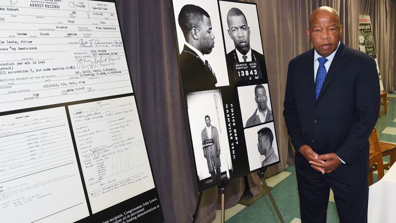 NASHVILLE, TN - NOVEMBER 19: Congressman/Civil Rights Icon John Lewis views for the first time images and his arrest record for leading a nonviolent sit-in at Nashville's segreated lunch counters, March 5, 1963. He was eariler honored with the Nashville Public Library Literary Award on November 19, 2016 in Nashville, Tennessee. (Photo by Rick Diamond/Getty Images)