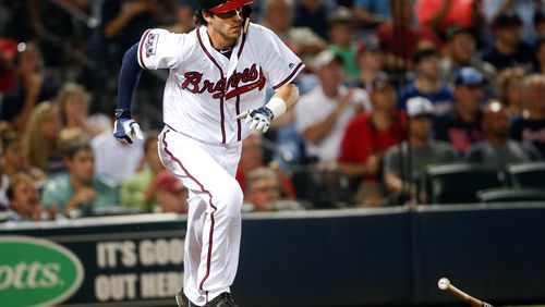 Atlanta Braves rookie Dansby Swanson connects for his first Major League hit with a single in the fourth inning of a baseball game against the Minnesota Twins in Atlanta, Wednesday, Aug. 17, 2016. Swanson was making his Major League debut. (AP Photo/John Bazemore)