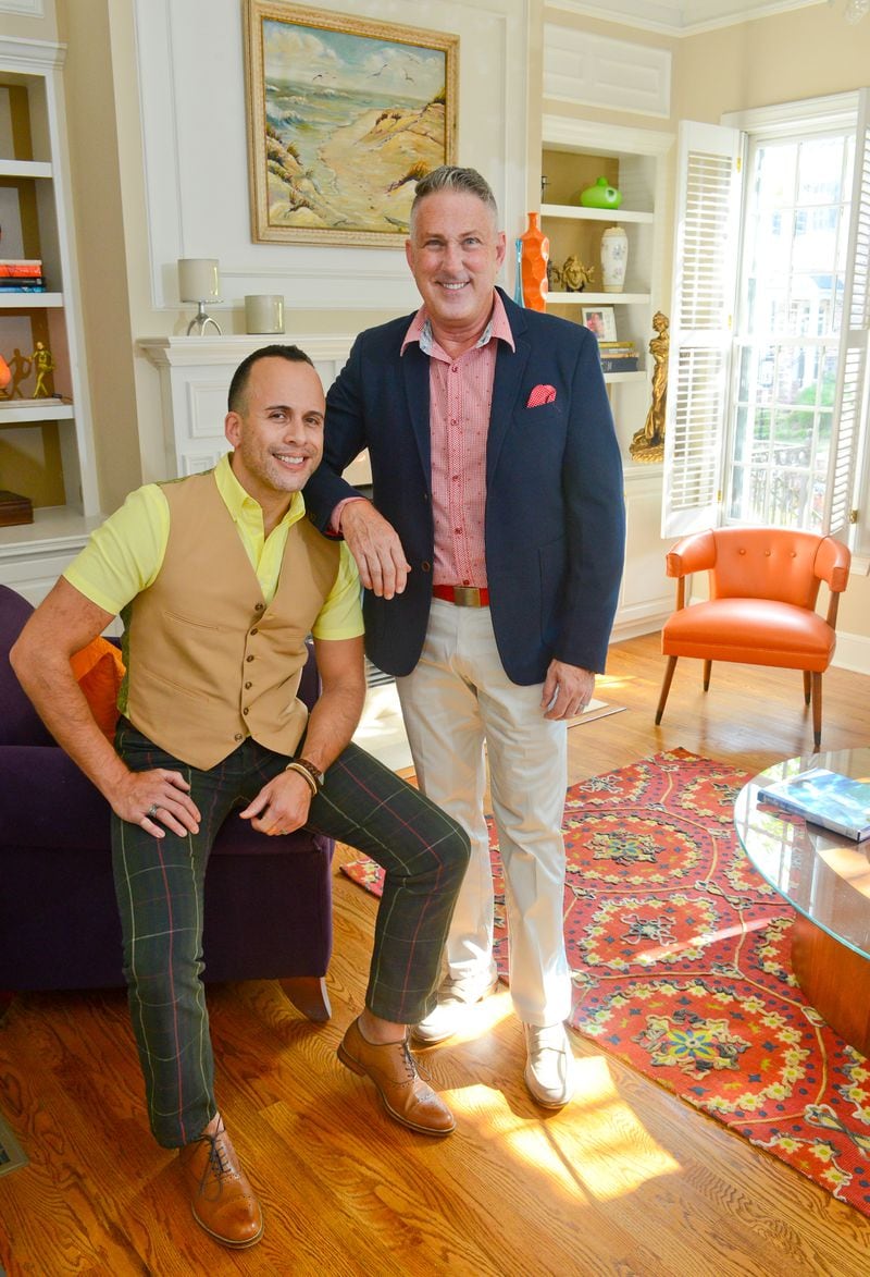 Pedro Ayestaran Diaz and Jeffrey Chandler moved into their three-bedroom, four-and-a-half-bath townhome in Vinings in May 2015. Ayestaran Diaz is a hair stylist at Hairdresser's Inc. in Marietta and Chandler is a consultant for Cobb County School District. Their eclectic interior design style mixes mid-century modern with contemporary and 19th century antique furnishings. Text by Lori Johnston and Keith Still/Fast Copy News Service. (Christopher Oquendo Photography/www.ophotography.com)