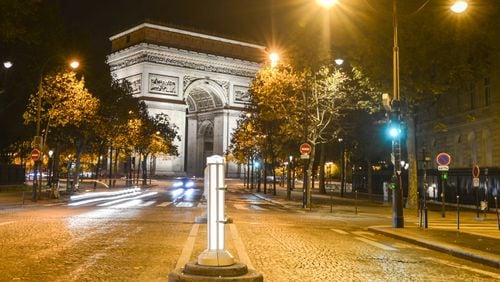 A nocturnal view of the Arc de Triomphe de Etoile, one of the most famous monuments in Paris. It stands in the centre of the Place Charles de Gaulle, seen from la plus belle avenue du monde Champs Elysees. (Artur Widak/Sipa USA/TNS)
