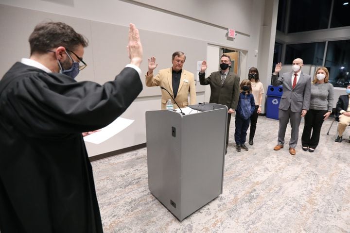 Dekalb County State Court Judge Mike Jacobs swore in John Mesa, Jimmy Furst and Elmer Veith to the Chamblee City Council on Thursday, January 13, 2022. Miguel Martinez for The Atlanta Journal-Constitution