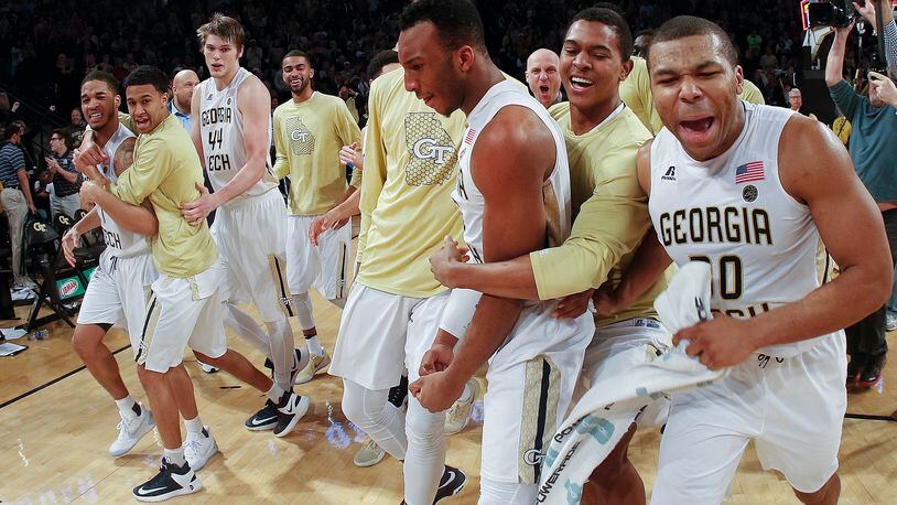Georgia Tech players celebrate after defeating Notre Dame 62-60 in an NCAA college basketball game Saturday, Jan. 28, 2017, in Atlanta. (AP Photo/John Bazemore)