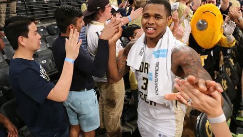 031616 Atlanta: Georgia Tech guard Marcus Georges-Hunt celebrates with fans after beating Houston 81-62 in their first round NIT basketball game on Wednesday, March 16, 2016, in Atlanta. Curtis Compton / ccompton@ajc.com