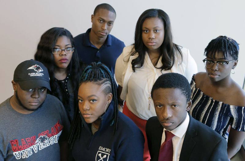 The AJC invited seven black college students to discuss the Netflix series "Dear White People." Front row: Antonio D. Curren Jr. (Clark Atlanta); Chelsea Jackson (Emory) and Jared Sawyer Jr. (Morehouse). Back row: Lauren Booker (GSU); DJ Lewis (Ga. Tech); Mary Pat Hector (Spelman) and Meagan Mwanda (UGA). (BOB ANDRES  /BANDRES@AJC.COM)