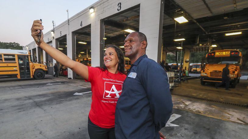 Atlanta Public Schools Superintendent Dr. Meria J. Carstarphen, taking a selfie on the first day of school in August with fleet technician Alfonzo Roberson. JOHN SPINK/JSPINK@AJC.COM