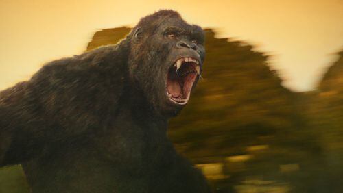 Kong protects the island against what he calls the “skullcrushers,” serpentine dragon-monsters that come up from the earth’s hollow core in”Kong: Skull Island.” (Warner Bros. Pictures via AP)
