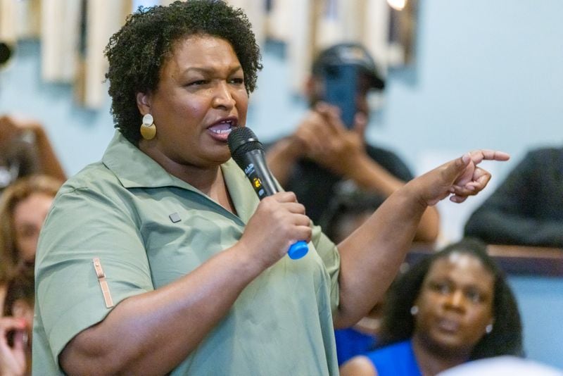 Democratic candidate for Georgia governor Stacy Abrams talks to a crowd during a campaign stop at the Two Eggs restaurant in McDonough Saturday, July 9, 2022. Steve Schaefer / steve.schaefer@ajc.com)