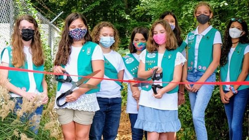 Decatur Junior Girl Scouts Troop 16307 earn Bronze Award by planting a zoo garden at Frazier-Rowe Park. (Pictured L-R: Lucy Hutcheson, Hannah Hughes, Cara Mullins, Mallory Harry, Norah Fonder-Kristy, Kate Morris, Claire McEnaney and Samantha Hill).