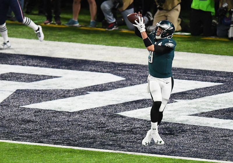 Philadelphia Eagles quarterback Nick Foles (9) catches a pass thrown by tight end Trey Burton (88) for a second-quarter touchdown during Super Bowl LII Feb. 04, 2018, at U.S. Bank Stadium in Minneapolis.