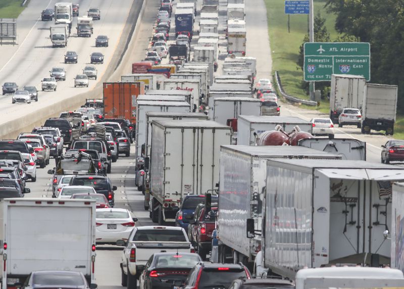 A state commission report is calling for Georgia to boost its annual spending road and rail improvements by $1.5 billion to better enable the transport of freight. JOHN SPINK /JSPINK@AJC.COM