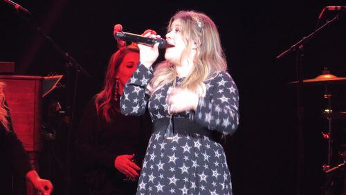 Kelly Clarkson did an abbreviated 14-song set for the Star 94.1 Christmas concert at the new Coca-Cola Roxy December 12, 2017. CREDIT: Rodney Ho/rho@ajc.com