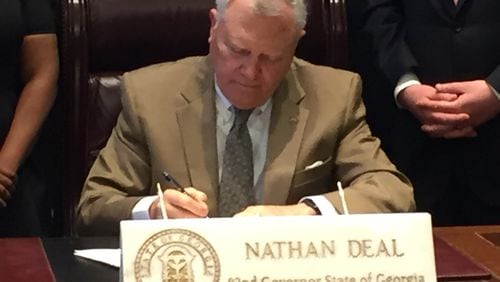 Gov. Nathan Deal signed sexual assault evidence reform legislation into law April 26, 2016.
