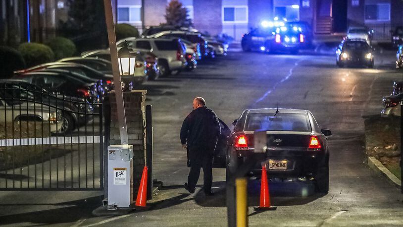 DeKalb County police investigate a shooting at the Artesian East Village apartments on Bouldercrest Road on Thursday morning.
