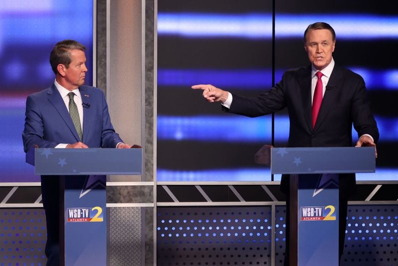 In 2022, former Sen. David Perdue, right, followed the urgings of former President Donald Trump to launch a bid to unseat Gov. Brian Kemp in that year's Republican primary. He lost by 52 percentage points. (Miguel Martinez/The Atlanta Journal-Constitution/TNS)