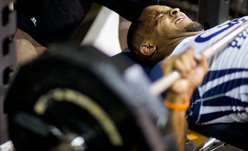 Isaiah Johnson bench presses in front of scouts during NFL Pro Day at Georgia Tech Friday, March 13, 2015, in Atlanta. (AP Photo/David Goldman) Safety Isaiah Johnson takes part in bench press drill for NFL scouts. (AP)