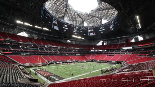 Mercedes-Benz Stadium is empty of fans but the Atlanta Falcons open the roof as they prepare to play the Seattle Seahawks in the season opener Sunday, Sept. 13, 2020 in Atlanta. (Curtis Compton / Curtis.Compton@ajc.com)