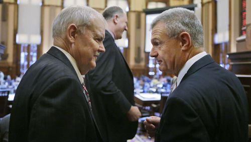 Rep. Randy Nix (right), R - LaGrange, who carried the bill in the House, confers with Sen. Lindsey Tippins, R-Marietta, who sponsored the bill, after it's passage. Senate Bill 364 passed the House Tuesday. It is the biggest education-related bill of this legislative session. It cuts back on testing and the use of tests in teacher evaluations, affecting more than 100,000 teachers and 1.7 million Georgia students. BOB ANDRES / BANDRES@AJC.COM