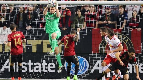 Atlanta United RC goalkeeper Alec Kann saves a shot against the N.Y. Red Bulls during their first game in franchise history on Sunday, March 5, 2017, in Atlanta. (Curtis Compton/ccompton@ajc.com)
