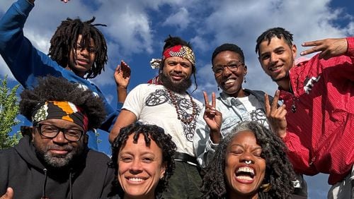 Members of the Black cycling collective Red, Bike and Green pose on a sunny day in Atlanta. Front row (L to R): Sylvester Price, Tasha Gomes, Zahra Alabanza. Back row (R to L): Chad Park, Kimerie Swift, Kenneth Florence Jr., and Marley Alabanza.