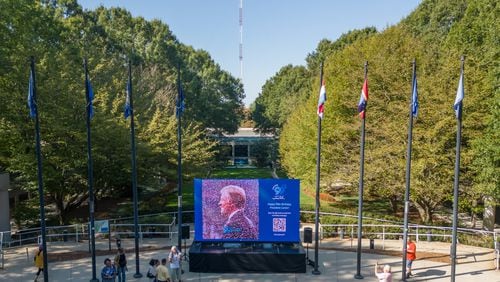 September 30, 2023. Atlanta. GA.  Video screen set up in front of the Jimmy Carter Library and Museum, showing a mosaic of people wishing President Carter a happy 99th birthday.   Photo by Michael  A. Schwarz/The Carter Center