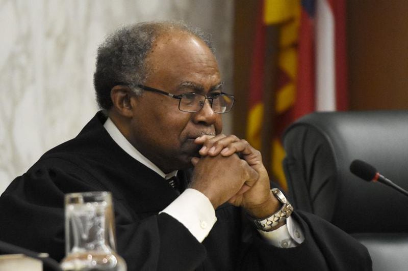 Justice Robert Benham listens to arguments before the Georgia Supreme Court in 2017. Benham, the state high court’s first African American jurist, is retiring. (DAVID BARNES / DAVID.BARNES@AJC.COM)