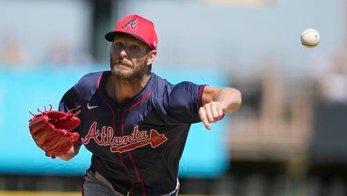 Atlanta Braves starting pitcher Chris Sale throws during the first inning of a spring training baseball game against the Pittsburgh Pirates Tuesday, Feb. 27, 2024, in Bradenton, Fla. The Pirates won 13-4.  (AP Photo/Charlie Neibergall)