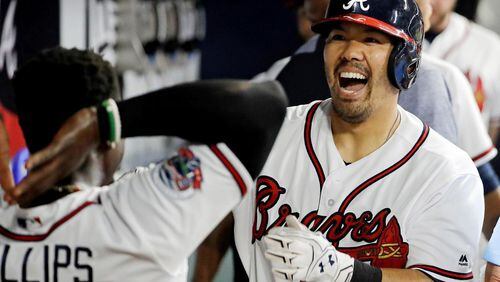 Kurt Suzuki’s two-run homer in the eighth inning accounted for the final runs in the Braves’ stirring 7-4 win against the Nationals on Friday. (AP photo)