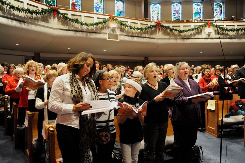 Each holiday season singers bring their own scores and join in for a "Messiah" sing-along at area churches. This one was at Roswell United Methodist Church a few years ago.
