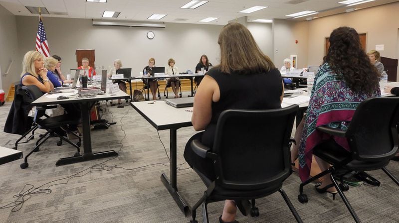 The Georgia Board of Nursing hears the case of a nurse (front center, seated next to her attorney), now in recovery, who became addicted to opioids and allegedly stole drugs from patients. Of 224 persons publicly disciplined by the Board of Nursing from November 2016 to April 2018, at least 140 of the cases involved alcohol or drugs, and of those, 66 cases involved opioids. BOB ANDRES / BANDRES@AJC.COM
