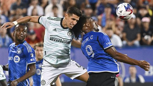 Atlanta United's Luis Abram, left, clears the box as CF Montreal's Chinonso Offor moves in during the second half of an MLS soccer match Saturday, July 8, 2023, in Montreal. (Graham Hughes/The Canadian Press via AP)