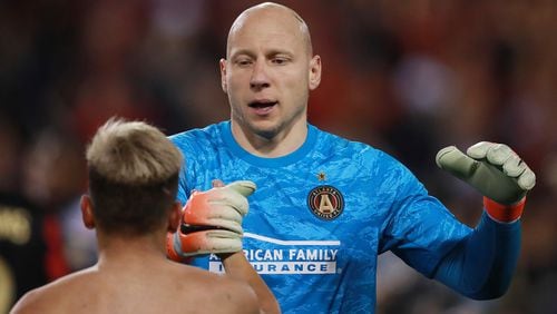 Feb. 28, 2019 Kennesaw: Atlanta United goalkeeper Brad Guzan celebrates a 4-0 victory over C.S. Herediano with Esequiel Barco in their Concacaf Champions League soccer match on Thursday, Feb. 28, 2019, in Kennesaw.    Curtis Compton/ccompton@ajc.com