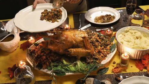 A lot of time goes into the traditional Thanksgiving feast. AJC File