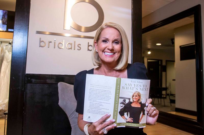 07/10/2020 - Atlanta, Georgia - Lori Allen, owner of Bridals by Lori and star of TLC's decade-long "Say Yes to the Dress Atlanta," sits for portrait inside the bridal store in Atlanta, Friday, July 10, 2020.Allen has written a book to encourage women over the age of 50 to embrace themselves and not choose the dowdy grandmother route. (ALYSSA POINTER / ALYSSA.POINTER@AJC.COM)